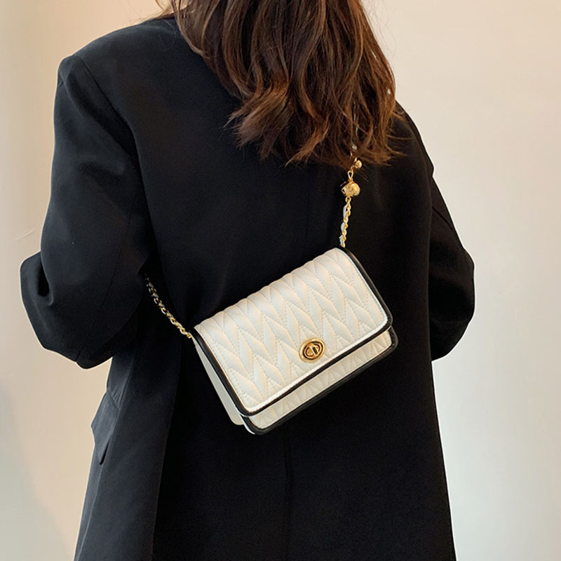 A simple texture small square bag and a shoulder crossbody bag