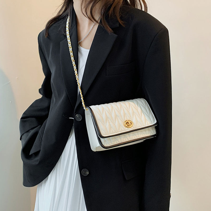 A simple texture small square bag and a shoulder crossbody bag